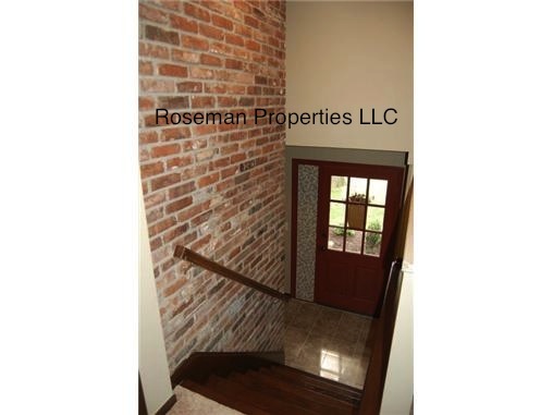 Stair from entry to Upper Living Room - 8915 Rene St