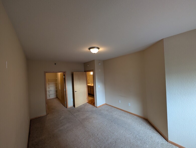 Primary bedroom with large walk-in closest - 1155 Ford Road