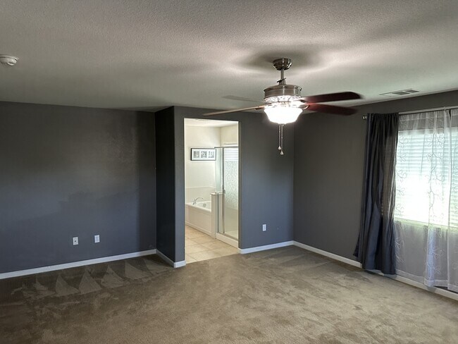 Building Photo - This stunning corner home offers 4 spaciou...