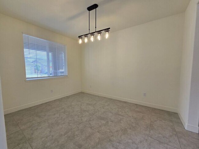 Building Photo - Beautiful Kiley Ranch Home with Open Floor Plan & Private Backyard