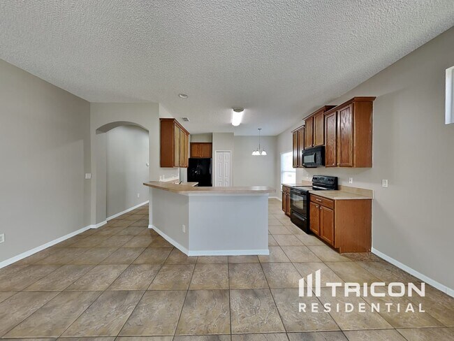 Building Photo - 14308 Tanja King Blvd