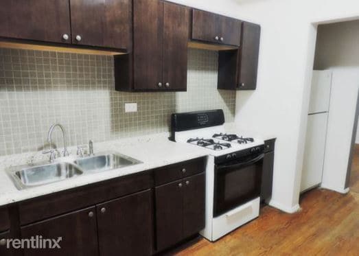 Building Photo - 2 br, 1 bath Condo - 6129 S Eberhart Ave 3...