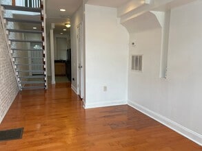 Building Photo - Charming 2-Bedroom, 1.5-Bathroom Brick Townhouse in Pigtown