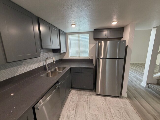 Building Photo - BEAUTIFULLY RENOVATED 3/2/2 CAR WITH DEN