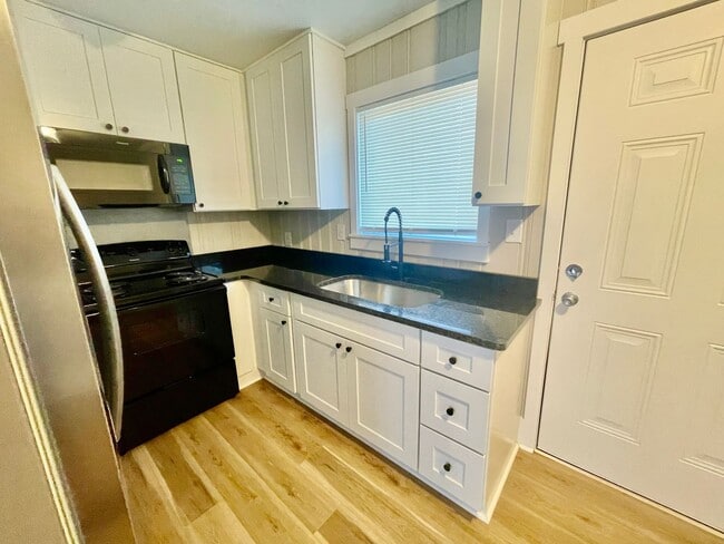 Building Photo - Welcome to Burgess2937, A Newly renovated charming 2-bedroom, 1-bathroom Duplex located in the vi...