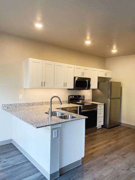 Building Photo - Aster Village