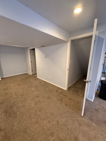 Living area - doors to storage and laundry rooms - 9559 Troon Village Dr