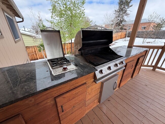 Building Photo - 4-Bed Home Near Clement Park with Entertainer’s Basement & Outdoor Oasis