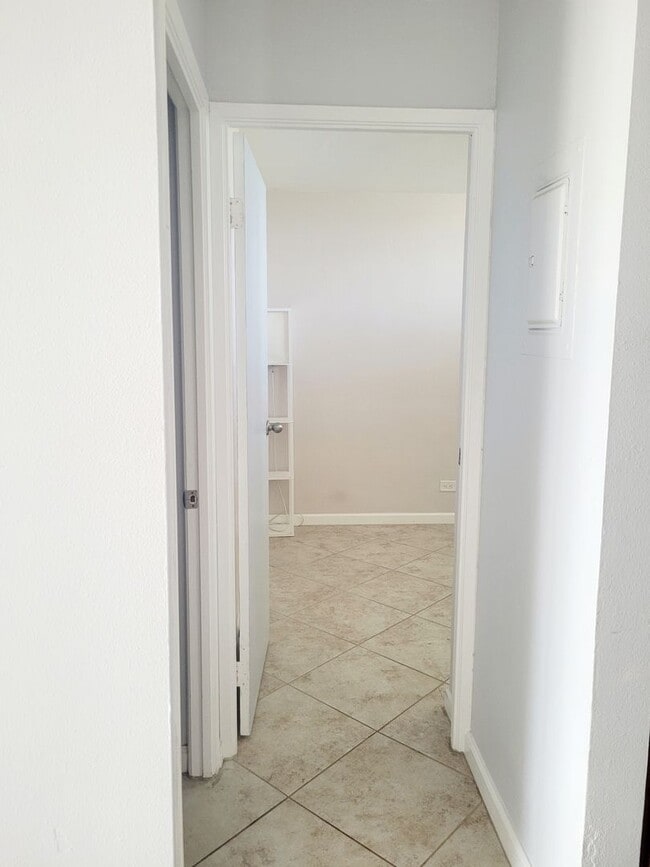 Building Photo - AVAILABLE | 2 Bedroom, 1 Bathroom Condo with 1 Assigned Parking Stall