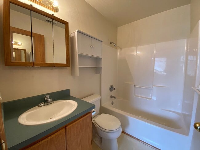 Building Photo - Great Duplex Unit with Attached Garage, Covered Patio, and Two Primary Suites