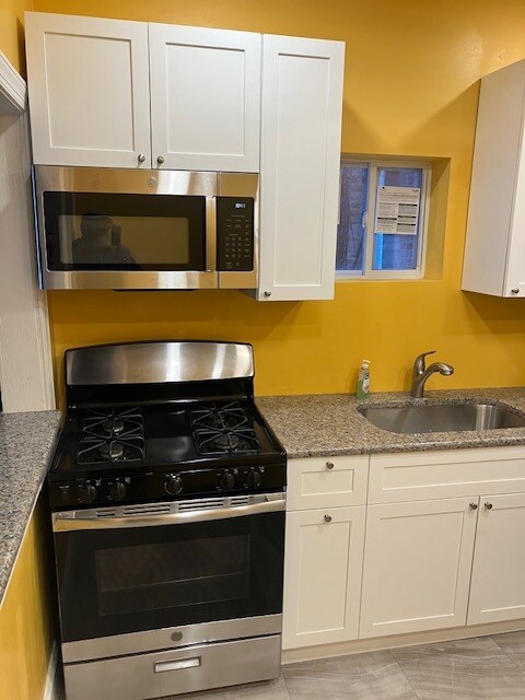 Building Photo - 6115 Lansdowne Ave