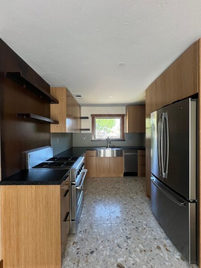 Building Photo - Artisan-Built Custom Cottage Retreat | Private Yard, Garage & EV Charging Ready