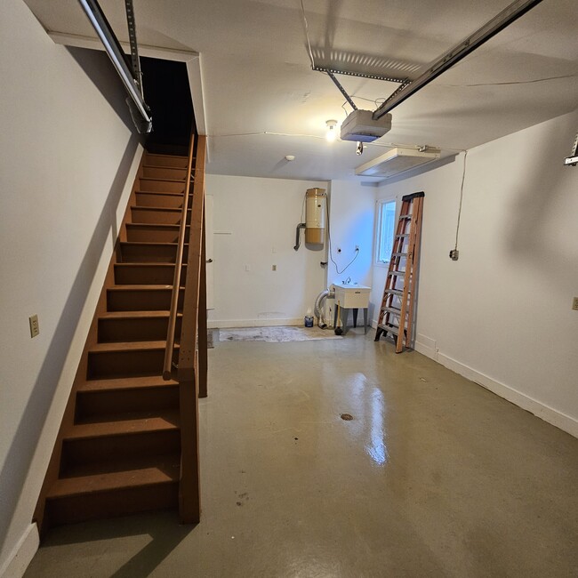 Stair to attic storage above garage - 77 Village Dr