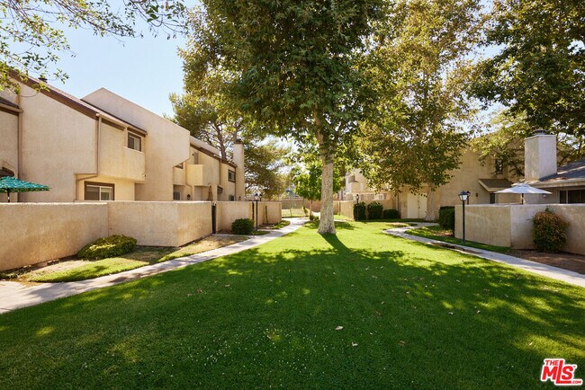 Building Photo - 1836 E Ave J2