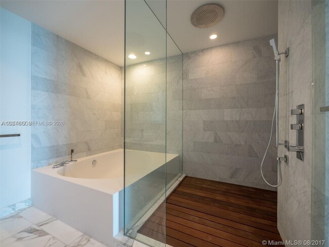 Building Photo - 10201 Collins Ave