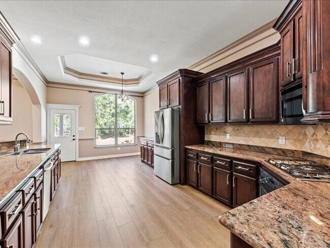 Building Photo - 6202 Sugar Bush Dr