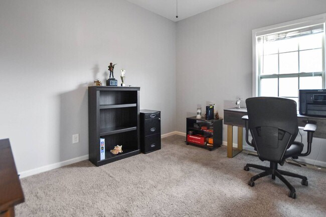 Building Photo - Pet Friendly Three Bedroom with Bonus!