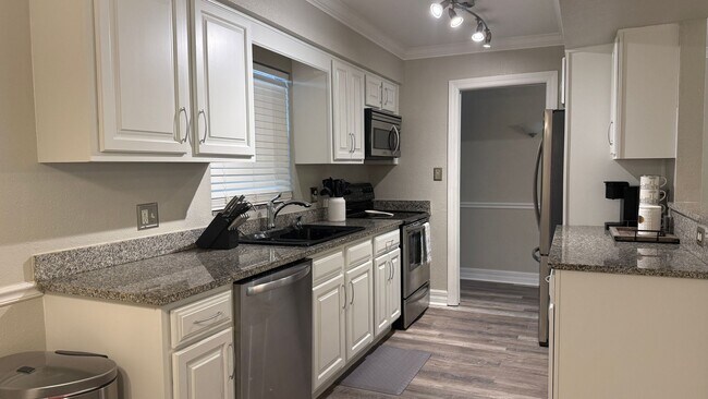 Building Photo - Charming 2/2 Seasonal Rental in Sarasota – Minutes from the Beach! Private Courtyard Included!!
