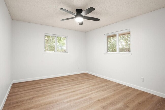 Building Photo - 8603 Woodstone Dr