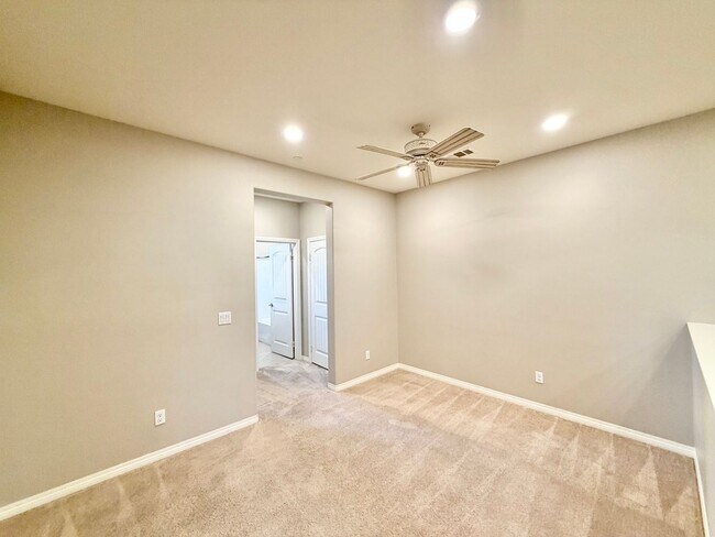 Building Photo - Move-In Ready 2 Bedroom 2.5 Bathroom Condo with LOFT & 2 Car Garage