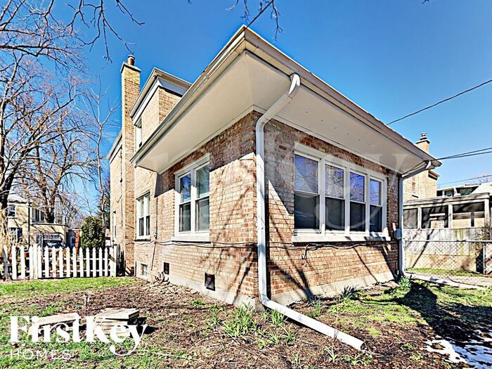 Building Photo - 1573 W 100th Pl
