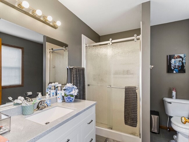 Building Photo - Spacious 3BR/3BA Condo with Finished Basement + 2-Car Garage — Available Now