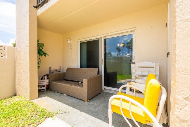 Building Photo - Wake Up to the Ocean Breeze – Your Beachsi...