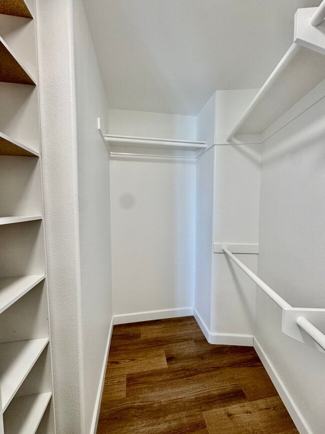 Building Photo - Beautifully Remodel Townhouse with AC & Two Car Garage!