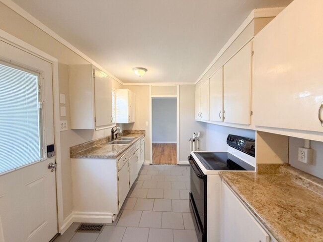 Building Photo - 3-Bedroom Single-Family Home Near TTU with Hardwood Floors and Carport