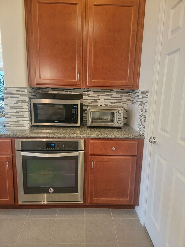 Building Photo - 4 bedroom home with a fully self  contained casita with a 3 car garage