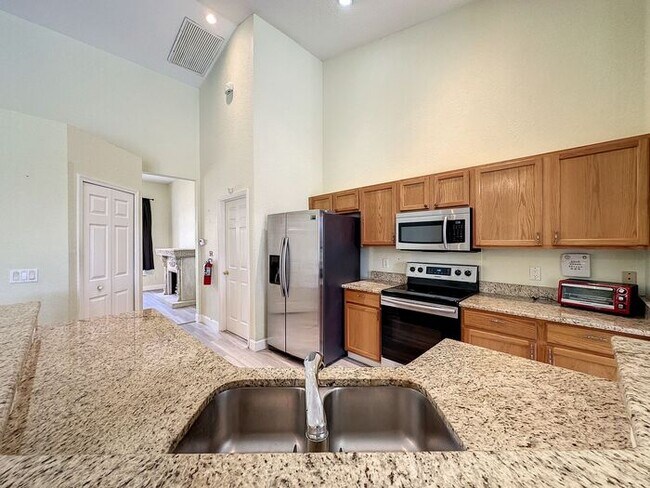 Building Photo - Beautiful Pool Home in Highlands Reserve golf community