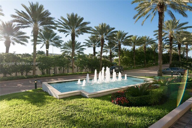 Building Photo - 10275 Collins Ave