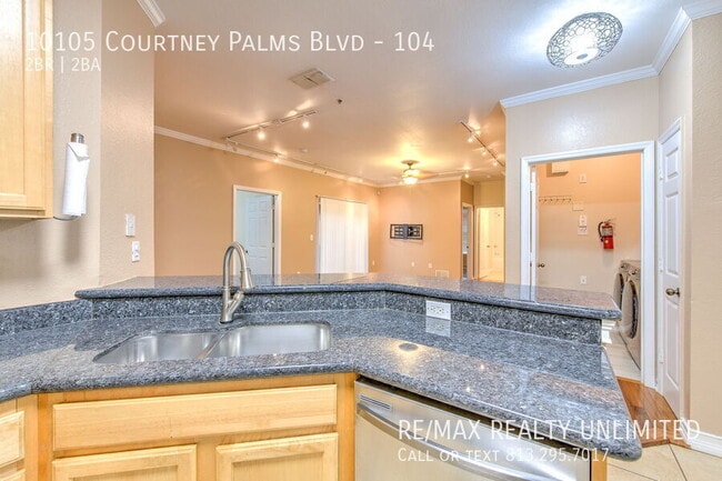 Building Photo - 10105 Courtney Palms Blvd