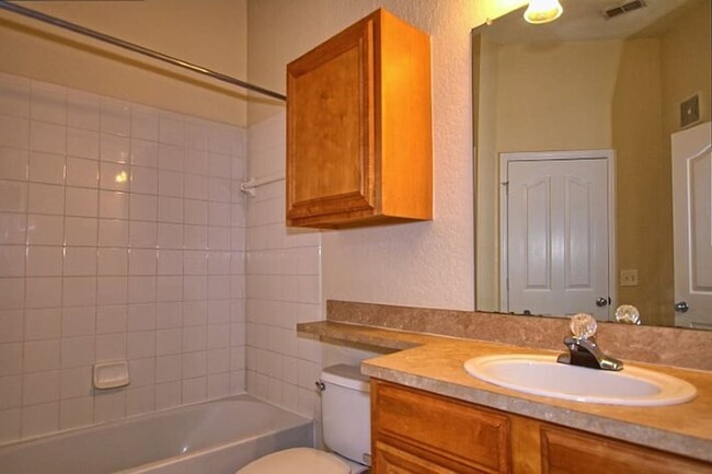 Building Photo - Private, updated, 2/2, 3rd-floor condo, wi...