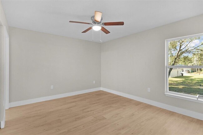 Building Photo - 9170 N Travis Dr