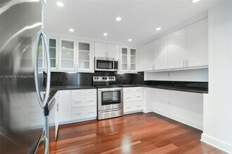 Building Photo - 9801 Collins Ave