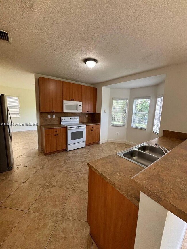 Building Photo - 9032 SW 208th Terrace