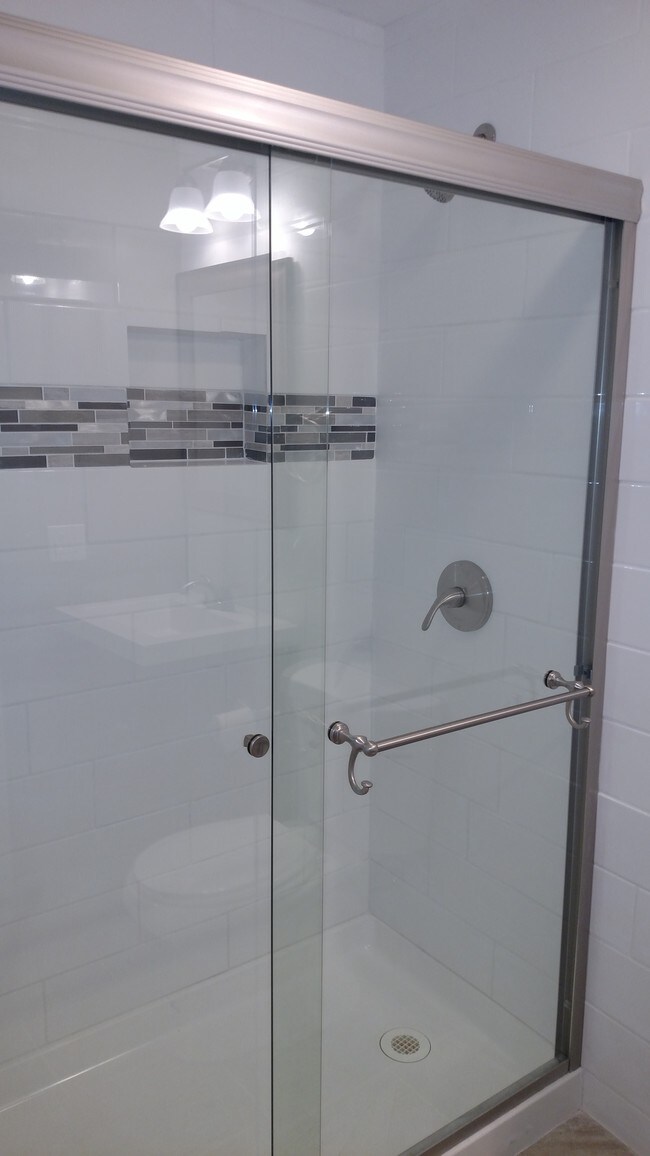 Newly Remodeled Shower - EastGate Apartments Leasing