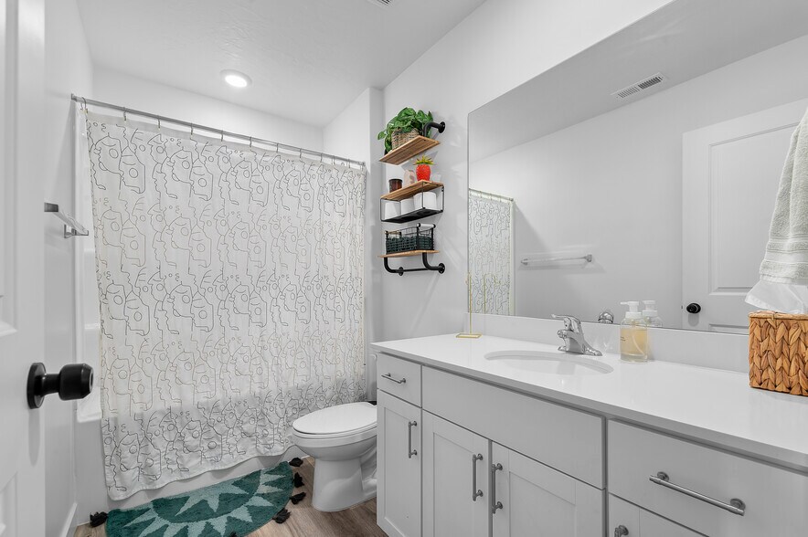 shared full bath for bedroom 2 and 3 - 678 W 1870 S