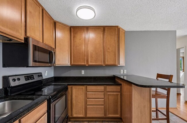 Building Photo - Awesome 2-Bed Condo Retreat in the Heart of Minneapolis  with Skyline views of Downtown