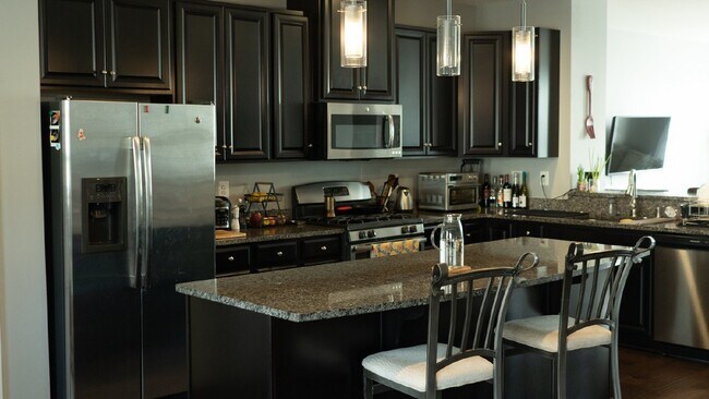 Building Photo - Modern 3 Level Townhome with 2 Car Garage