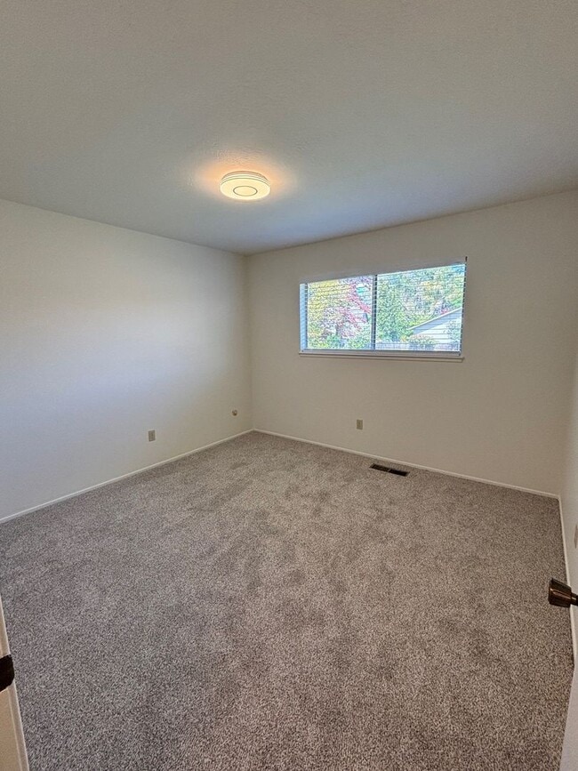 Building Photo - Single Level 3 Bedroom 2 Bathroom Bennett Valley Home with large private backyard