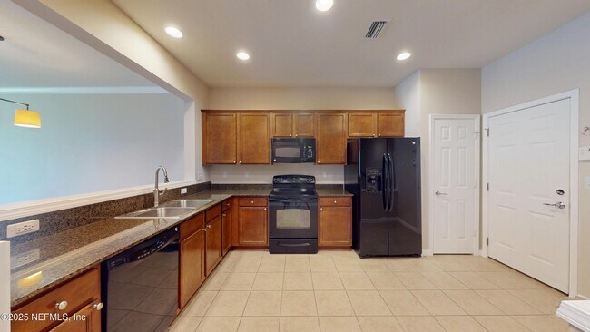 Building Photo - 6937 Woody Vine Dr
