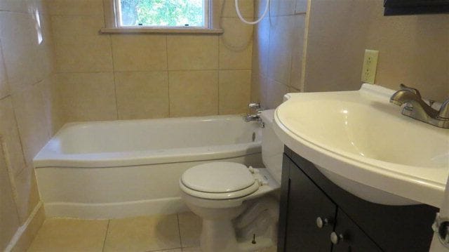 Newly remodeled bathroom with tile. - 1505 E. Hayden Street