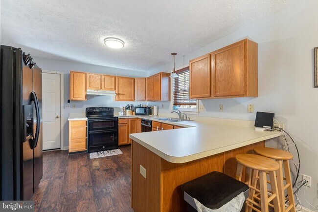Building Photo - 7715 Wellington Glen Dr