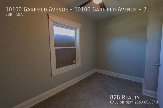 Building Photo - "Charming 2-Bedroom Oasis: Your Perfect Bl...