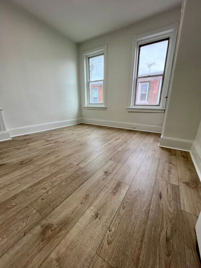 Building Photo - Newly Renovated 3-Bedroom Townhouse in Elmwood Park! Available mid-May! PHA VOUCHERS ACCEPTED!