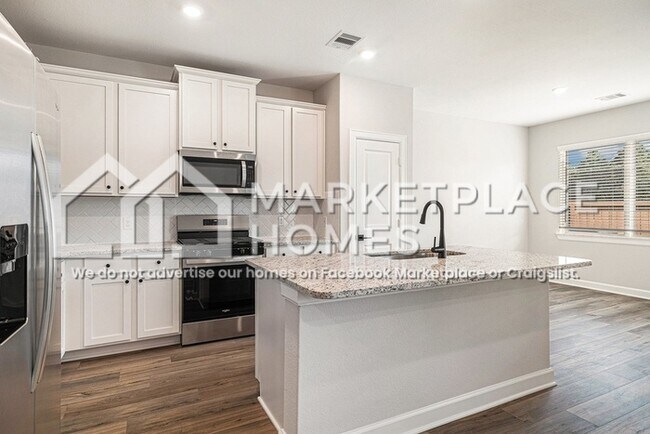 Building Photo - 6107 White Spruce Dr