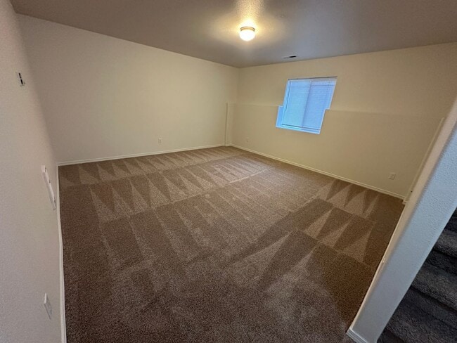Building Photo - MOVE IN SPECIAL! Spacious 2 bed/2.5 bath with bonus room townhome off Road 68
