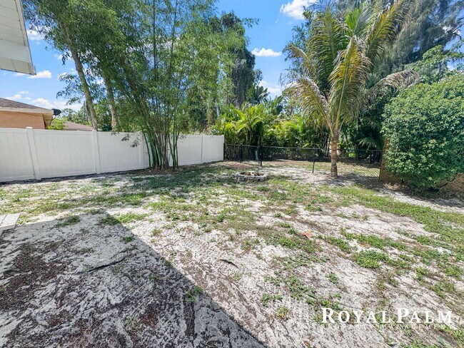 Building Photo - Tree-Lined 2BR/1BA Fort Myers Duplex with Fenced Yard, Storage Shed & In-Unit Laundry!